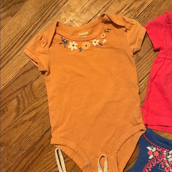 Colorful Baby Clothing Set. Includes Outfits, Tees, Onesies, Leggings, and Dress - Picture 2 of 16